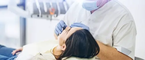 What You Should Know About Getting a Flouride Treatment - Impressions Dental